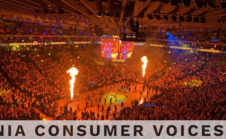 Lively basketball event with a huge crowd and fiery show in Oakland arena, capturing the vibrant sports atmosphere.